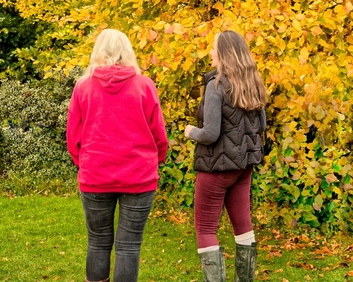 Raushia talking to a client as part of her Walk and Talk Sessions.